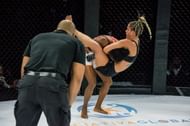 Luana Pinheiro locks in a standing guillotine choke to score victory
